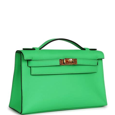 hermes kelly pochette vert comics swift gold hardware|Hermes kelly cut bag.